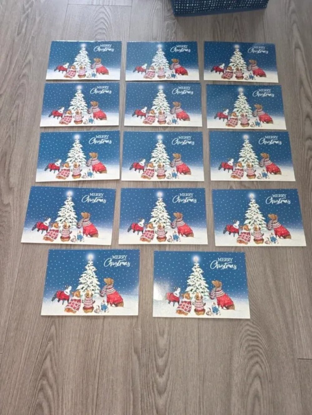 set of 14 cards featuring white Christmas tree and gift design